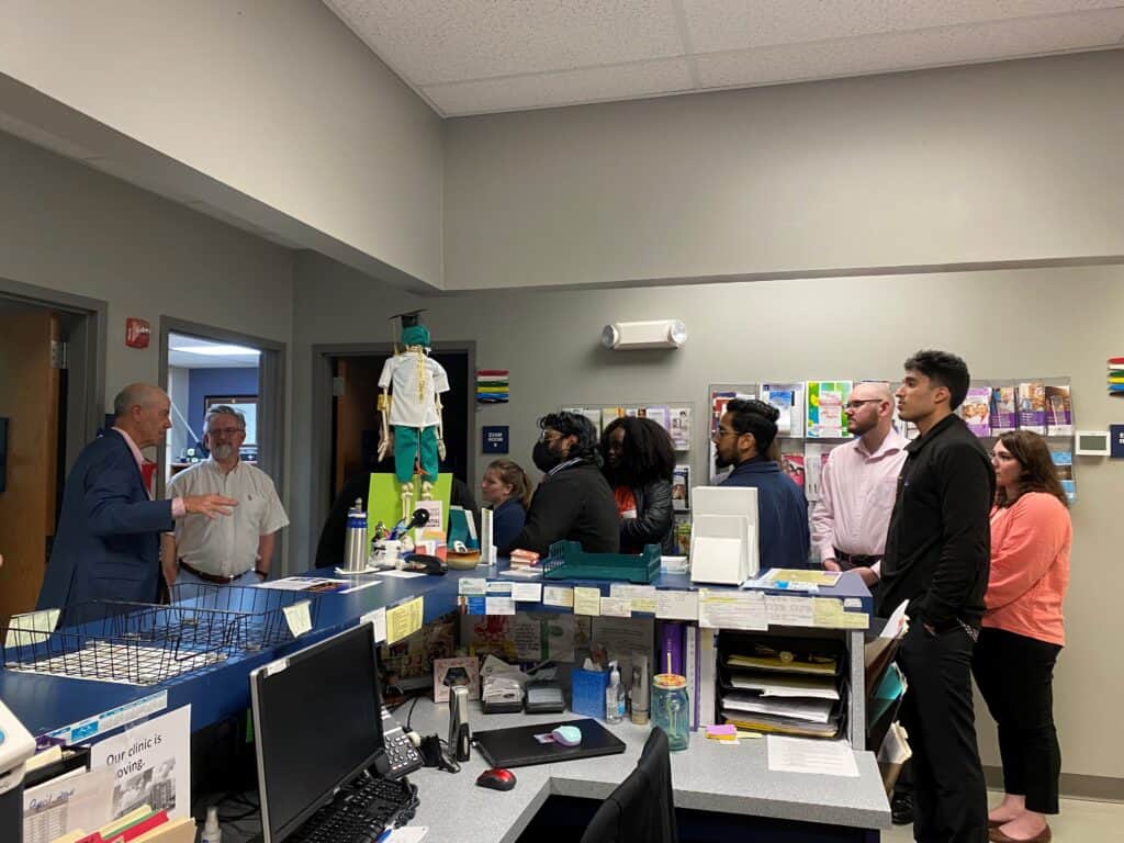 Jon Loudermilk, MD, Site Director for the Washington Regional Eureka Springs Family Clinic, visiting with medical students during the rural field trip tour. Dr. Loudermilk is a 2015 graduate of our UAMS South Central residency program in Pine Bluff. 