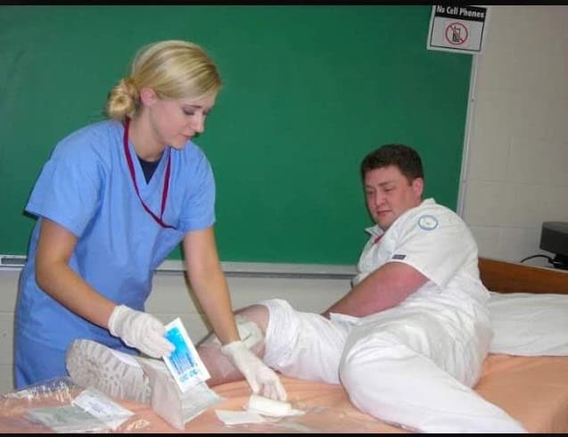 MyLisa during MASH 2008, changing a wound dressing