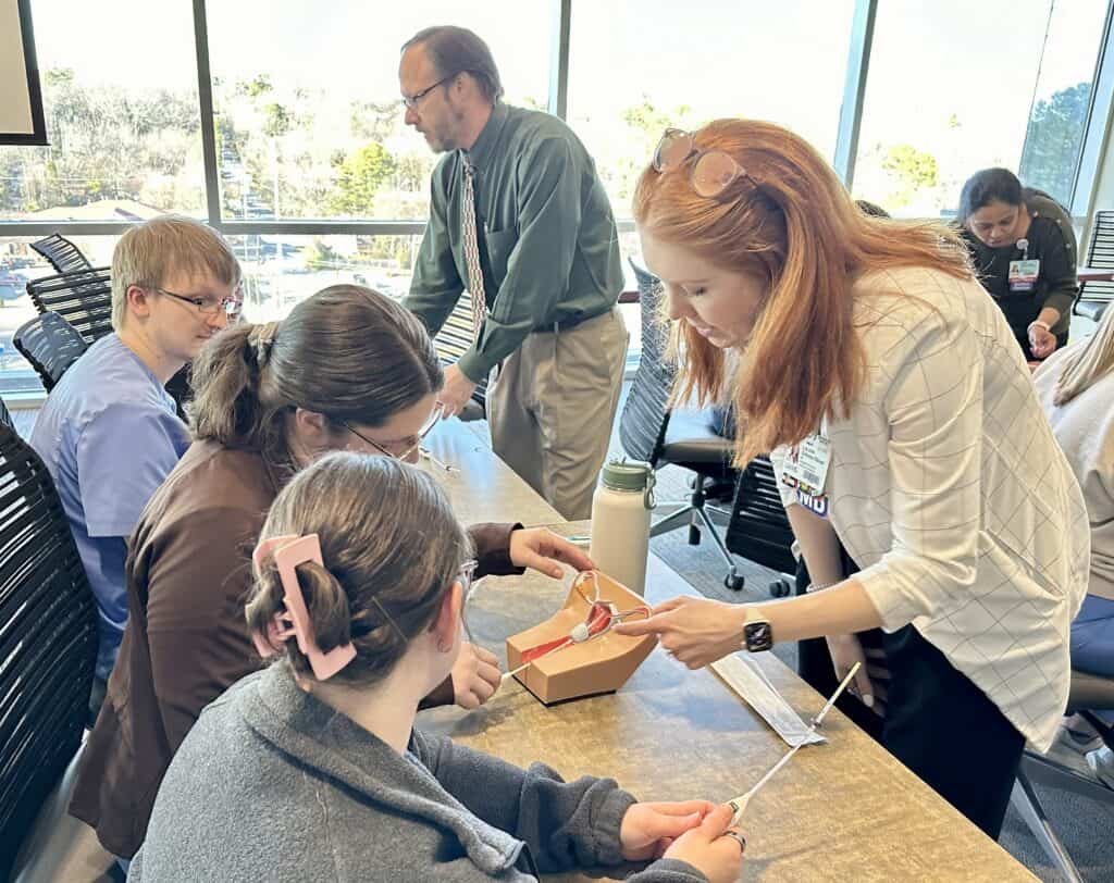 Honors in Underserved  in Primary Care students at a skills lab