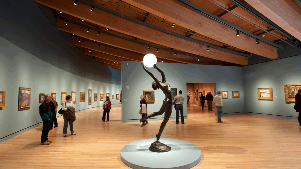 People looking at artwork in the museum of fine arts