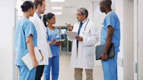 Shot of a group of medical practitioners having a discussion in a hospital