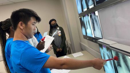 Students at MASH camp learning about radiology